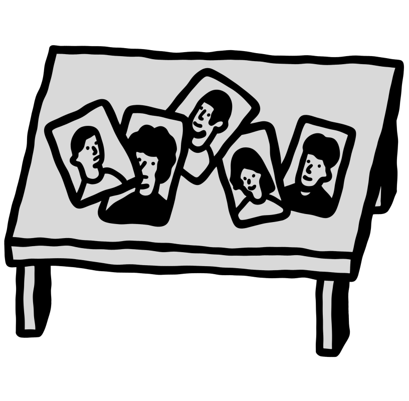 5 askew portraits on a table